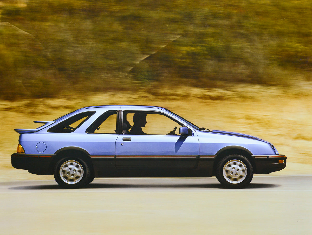 This archival image documents the 1986 Merkur XR4Ti two-door and is preserved in the Ford Heritage Vault as part of Ford Motor Company's historic photographic archive. Free for personal, non-commercial use. Ford Heritage Vault reference AR-2001-88...
