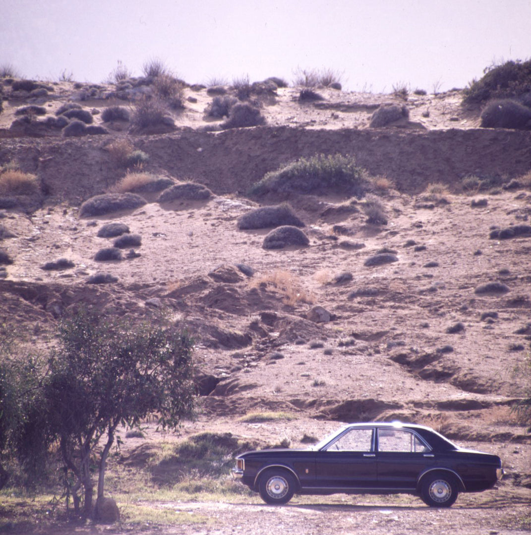 This archival image documents the 1971 Ford Granada base side view with scenic desert hill in Cyprus and is preserved in the Ford Heritage Vault as part of Ford Motor Company's historic photographic archive. Free for personal, non-commercial use. ...