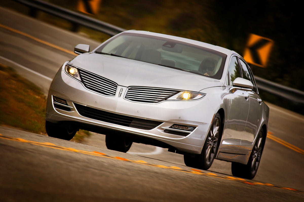 This archival image documents the 2013 Lincoln MKZ and is preserved in the Ford Heritage Vault as part of Ford Motor Company's historic photographic archive. Free for personal, non-commercial use. Ford Heritage Vault reference AR-2008-8.1.1.2261.
