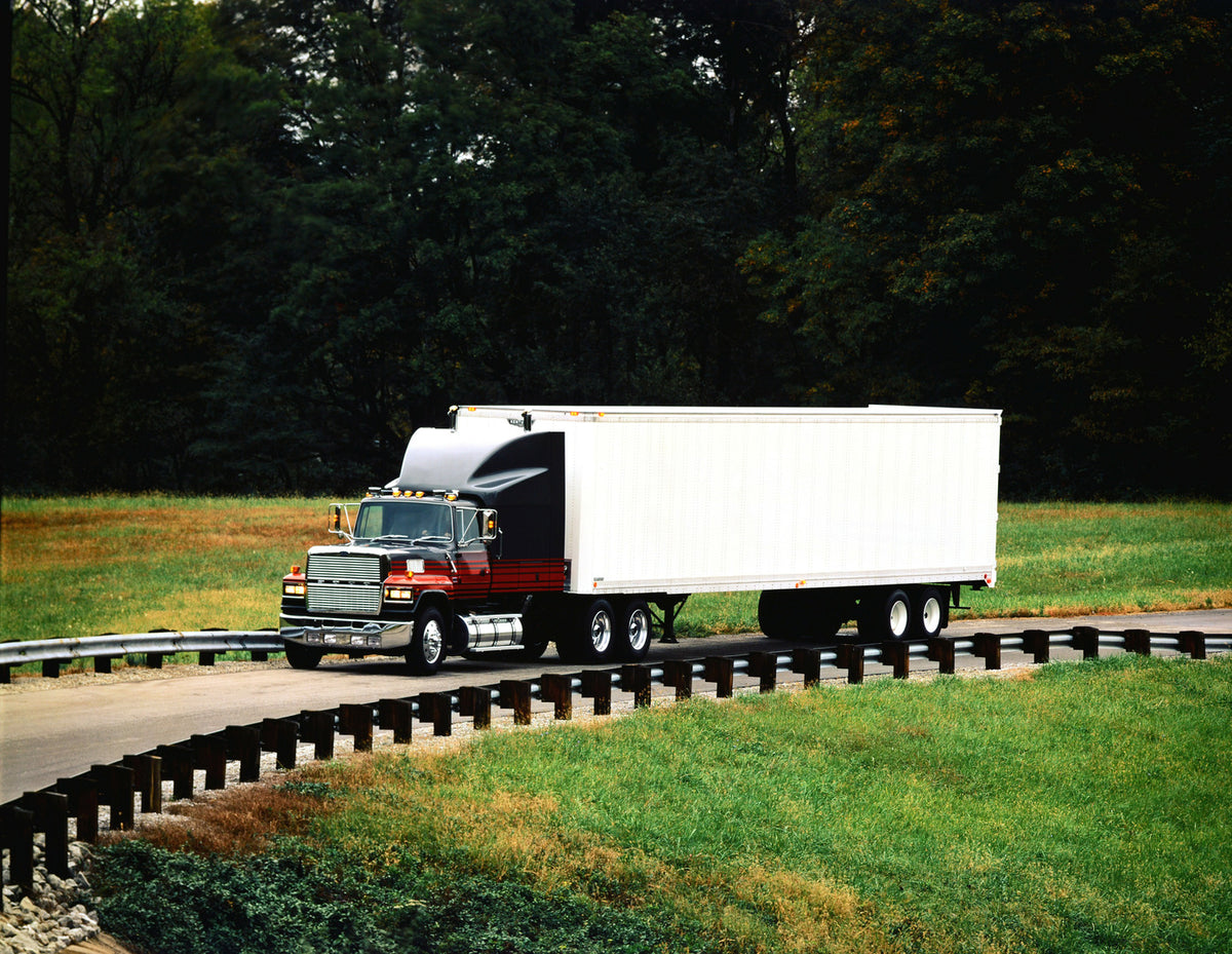 This archival image documents the 1991 Ford LTL-9000 and is preserved in the Ford Heritage Vault as part of Ford Motor Company's historic photographic archive. Free for personal, non-commercial use. Ford Heritage Vault reference AR-2001-94-208806....