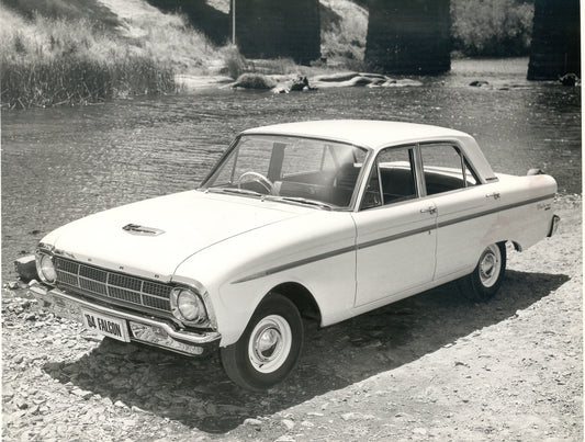 1964 Ford XM Falcon on scenic riverbank HV 1964-0110