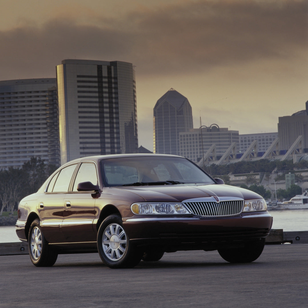 This archival image documents the 2000 Lincoln Continental with city skyline in background AR-2002-213709 and is preserved in the Ford Heritage Vault as part of Ford Motor Company's historic photographic archive. Free for personal, non-commercial ...
