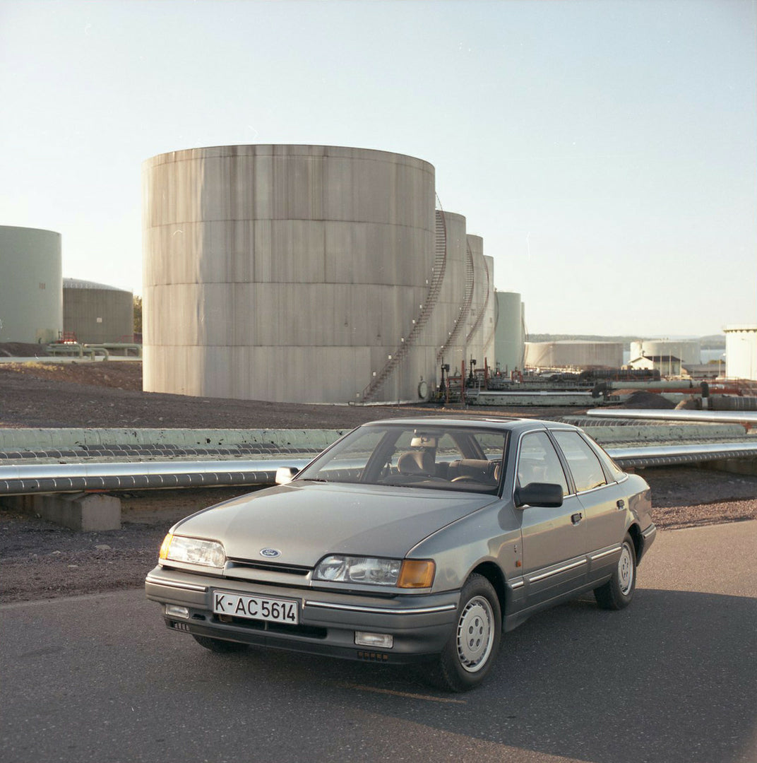 This archival image documents the 1986 Ford Granada Mark III Ghia in front of industrial building in Norway and is preserved in the Ford Heritage Vault as part of Ford Motor Company's historic photographic archive. Free for personal, non-commercia...