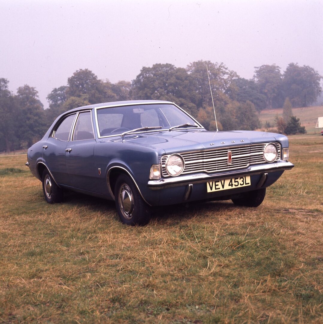 This archival image documents the 1972 Ford Cortina MK III 1600XL 4 door in scenic field and is preserved in the Ford Heritage Vault as part of Ford Motor Company's historic photographic archive. Free for personal, non-commercial use. Ford Heritag...