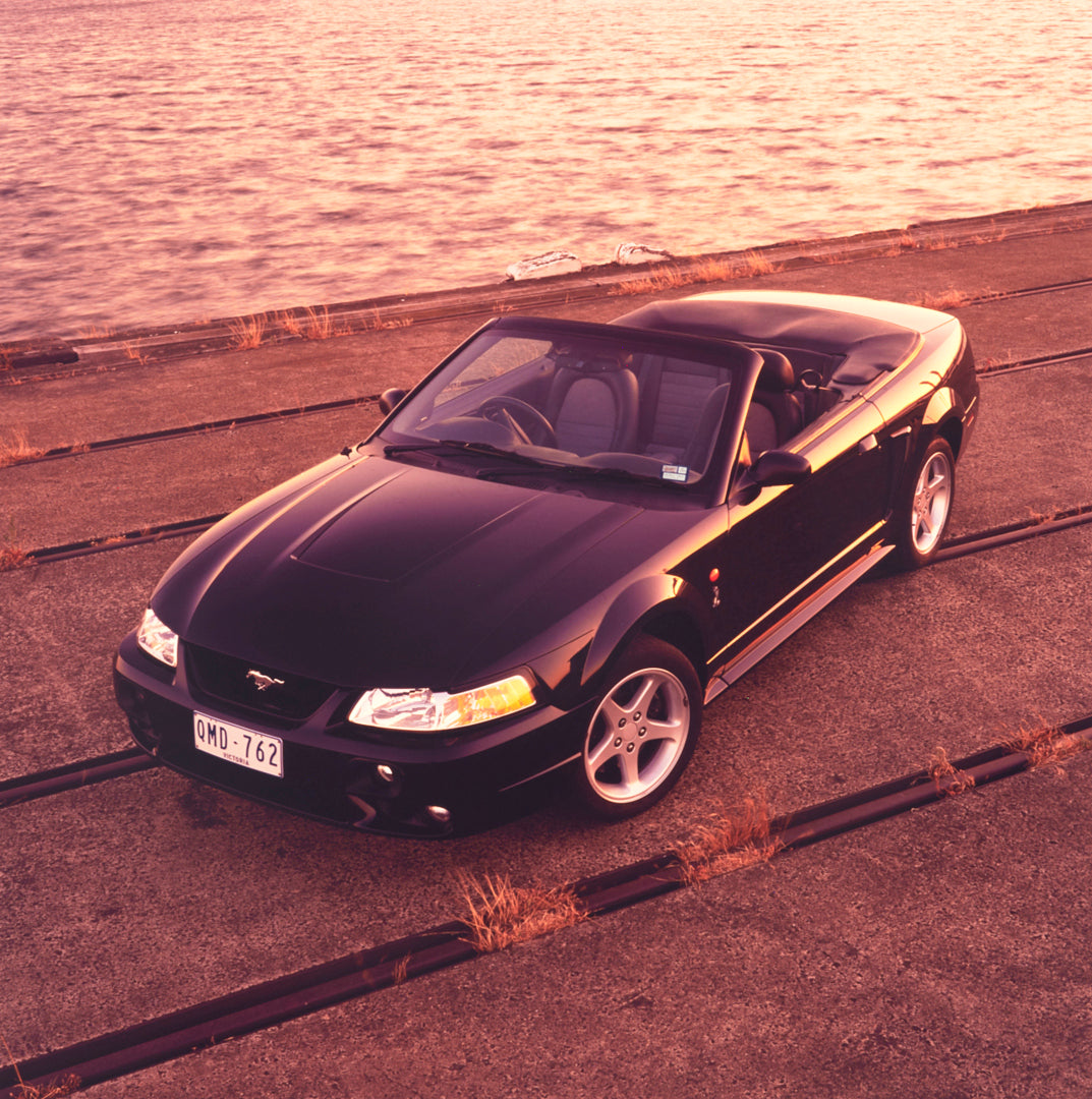 This archival image documents the 2004 Ford Mustang Convertible Passenger Side Front End View by the Waterfront FAP-2011-3 and is preserved in the Ford Heritage Vault as part of Ford Motor Company's historic photographic archive. Free for personal...