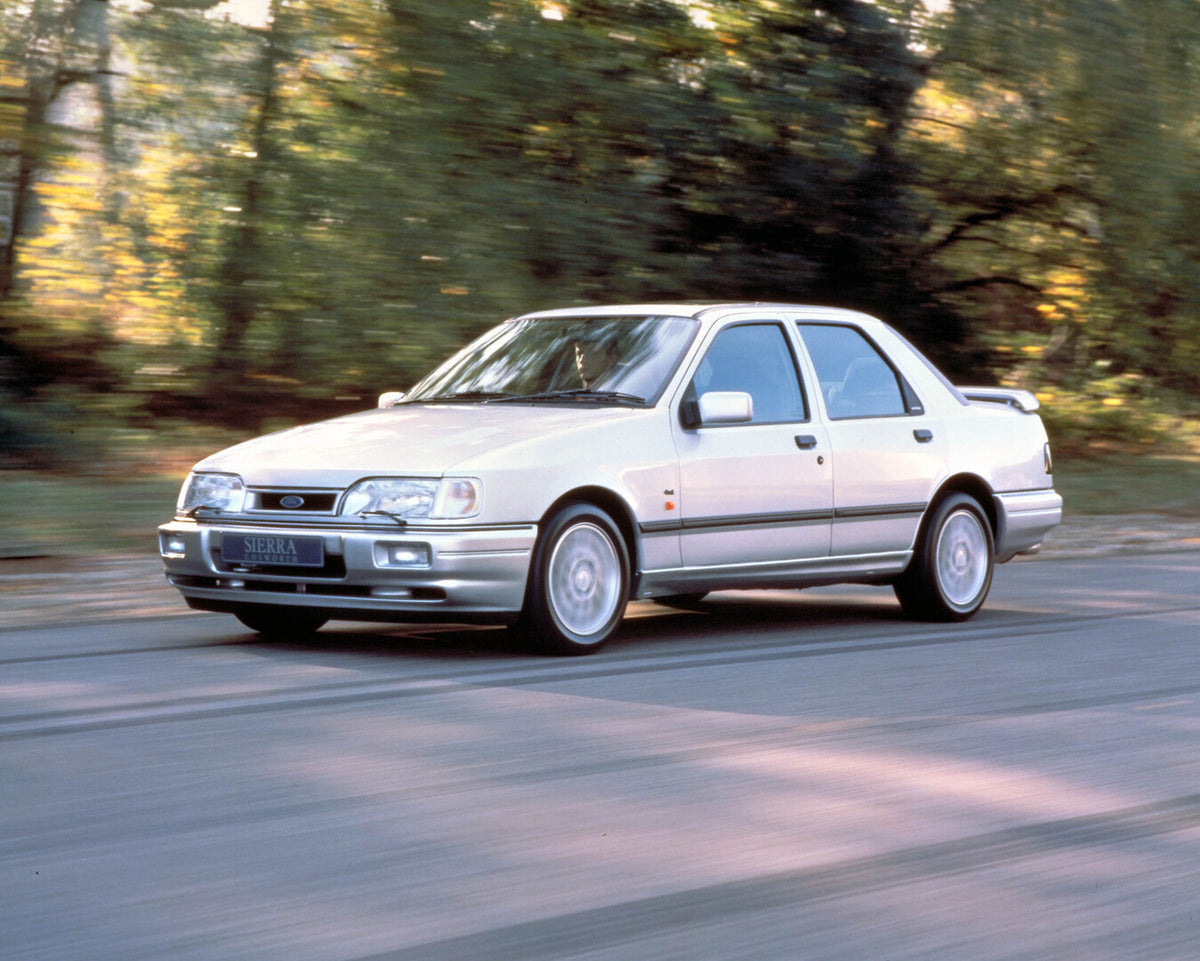 This archival image documents the 1991 Ford Sierra Cosworth action shot on scenic road 1991-189-Sierra- RS -Cosworth and is preserved in the Ford Heritage Vault as part of Ford Motor Company's historic photographic archive. Free for personal, non-...