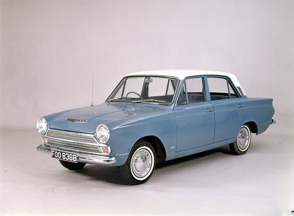 This archival image documents the 1965 Ford Cortina MK I Deluxe in studio and is preserved in the Ford Heritage Vault as part of Ford Motor Company's historic photographic archive. Free for personal, non-commercial use. Ford Heritage Vault referen...