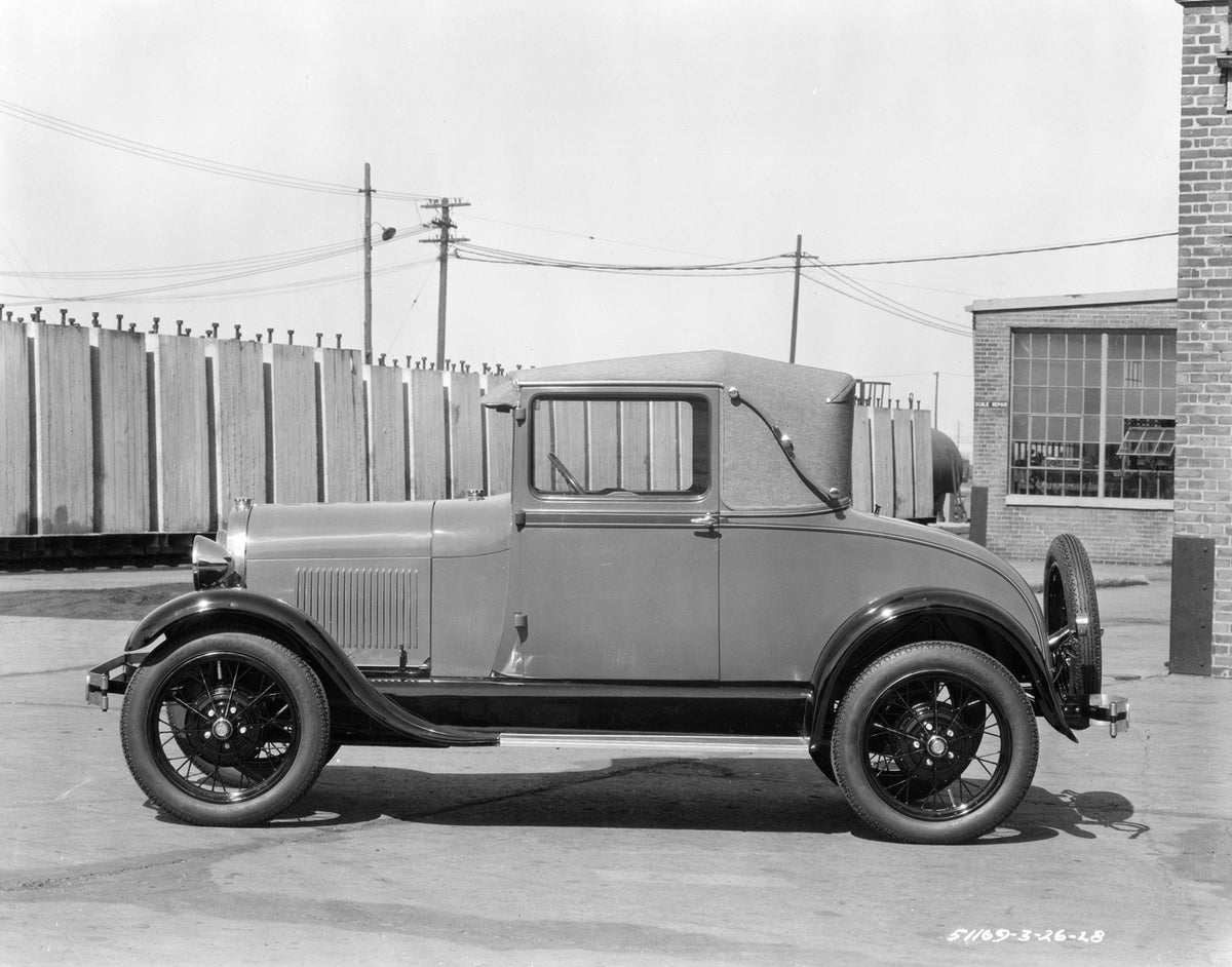 This archival image documents the 1928 Ford Model A Sport Coupe and is preserved in the Ford Heritage Vault as part of Ford Motor Company's historic photographic archive. Free for personal, non-commercial use. Ford Heritage Vault reference AR-2008...