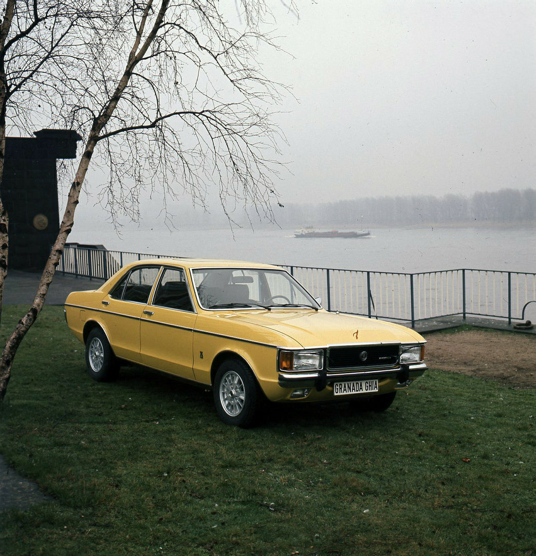 This archival image documents the 1975 Ford Granada Mark I Ghia near scenic lake in Germany and is preserved in the Ford Heritage Vault as part of Ford Motor Company's historic photographic archive. Free for personal, non-commercial use. Ford Heri...