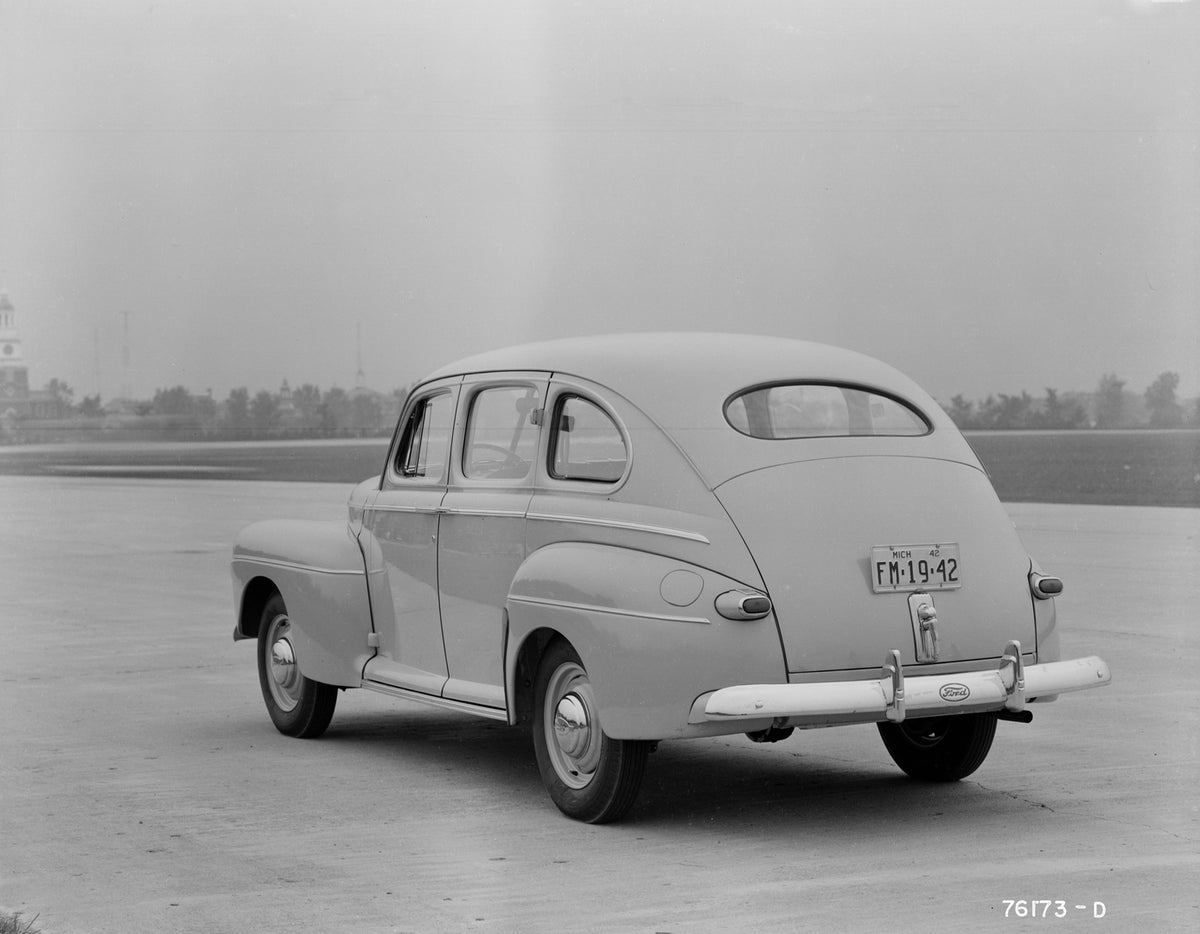 This archival image documents the 1942 Ford Super Deluxe fordor sedan and is preserved in the Ford Heritage Vault as part of Ford Motor Company's historic photographic archive. Free for personal, non-commercial use. Ford Heritage Vault reference A...