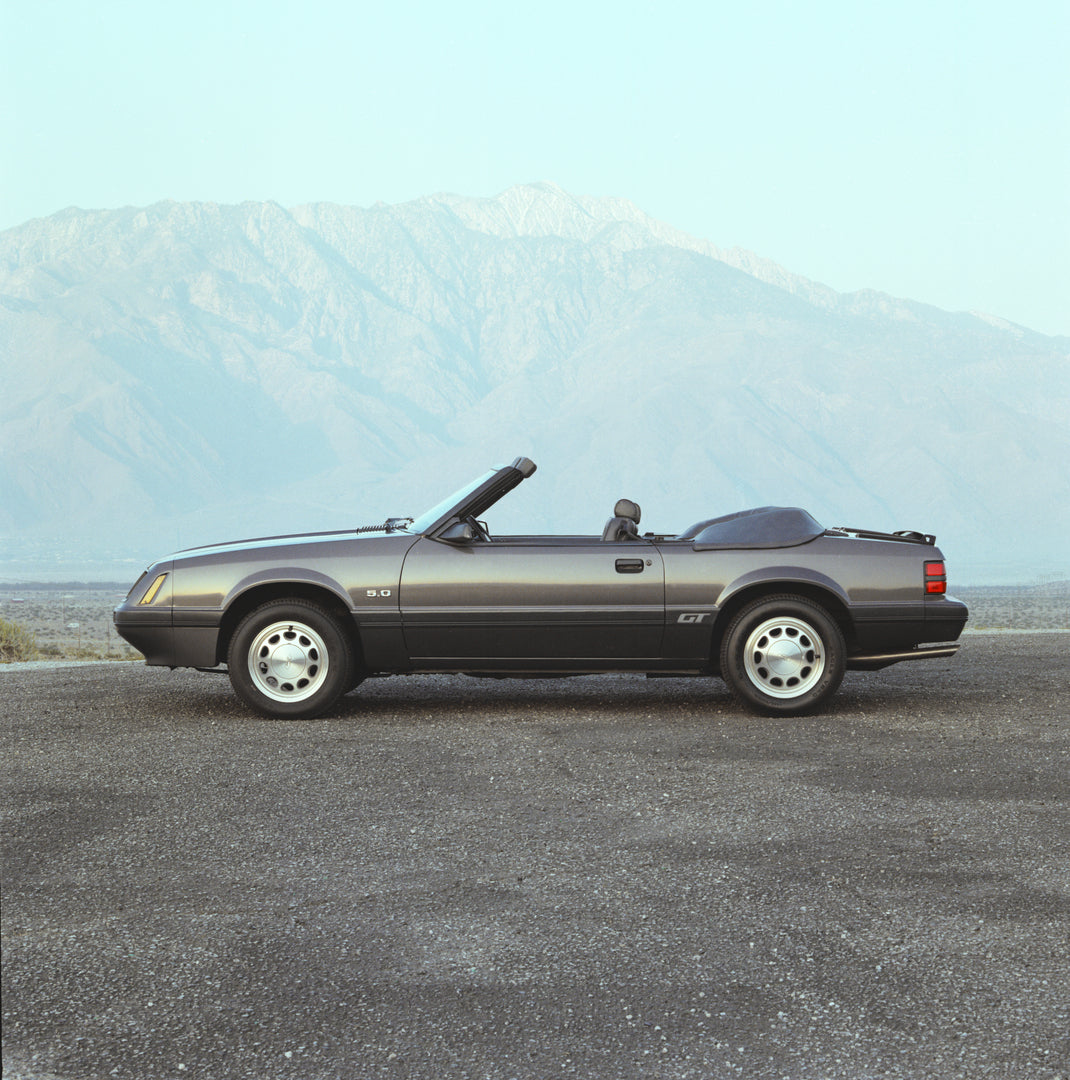 This archival image documents the 1986 Ford Mustang GT convertible and is preserved in the Ford Heritage Vault as part of Ford Motor Company's historic photographic archive. Free for personal, non-commercial use. Ford Heritage Vault reference AR-2...