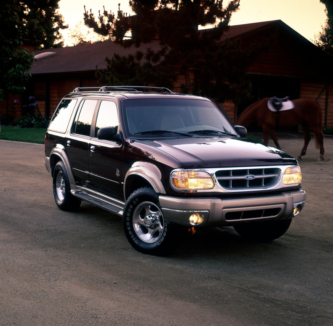 This archival image documents the 1999 Ford Explorer Eddie Bauer and is preserved in the Ford Heritage Vault as part of Ford Motor Company's historic photographic archive. Free for personal, non-commercial use. Ford Heritage Vault reference AR-200...