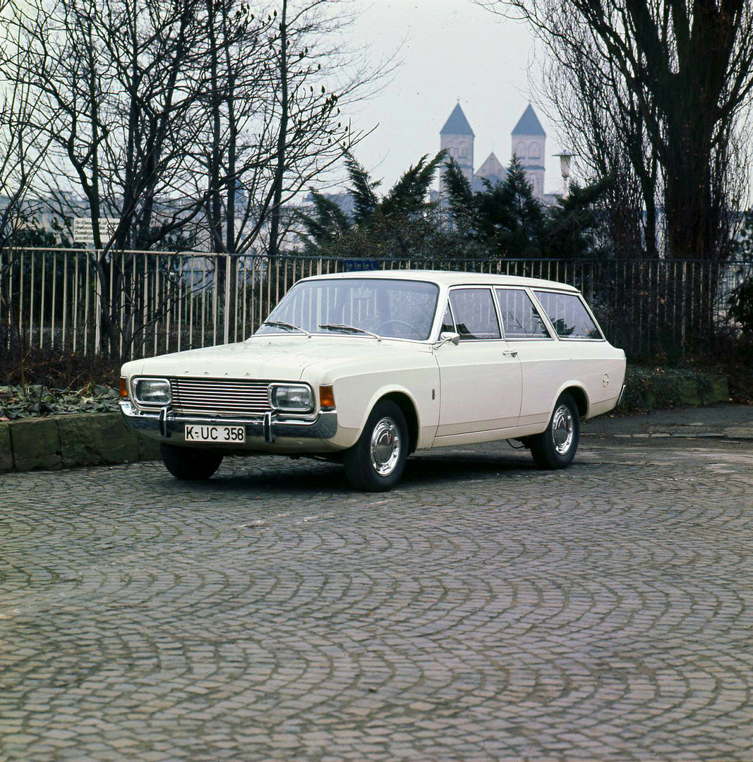 This archival image documents the 1971 Ford Taunus 20M with scenic trees and is preserved in the Ford Heritage Vault as part of Ford Motor Company's historic photographic archive. Free for personal, non-commercial use. Ford Heritage Vault referenc...