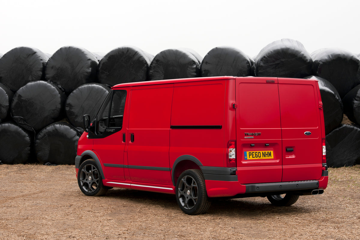 This archival image documents the 2010 Ford Transit Mark IV 140 SportVan rear view and is preserved in the Ford Heritage Vault as part of Ford Motor Company's historic photographic archive. Free for personal, non-commercial use. Ford Heritage Vaul...