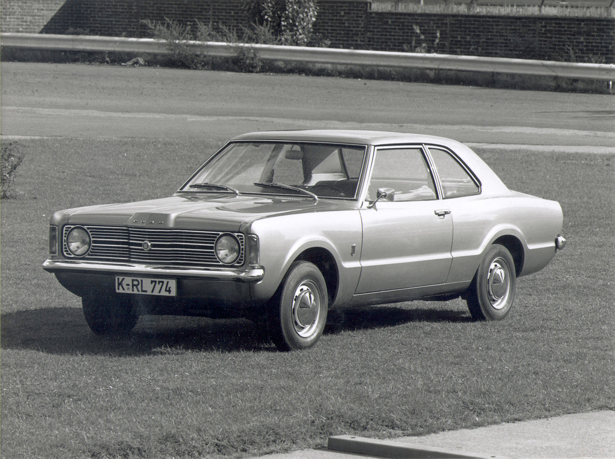 This archival image documents the 1970 Ford Taunus TC in scenic field and is preserved in the Ford Heritage Vault as part of Ford Motor Company's historic photographic archive. Free for personal, non-commercial use. Ford Heritage Vault reference A...