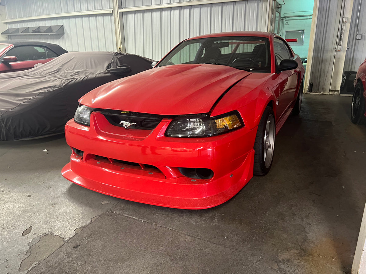 This archival image documents the 2000 Ford SVT Mustang Cobra R #1 and is preserved in the Ford Heritage Vault as part of Ford Motor Company's historic photographic archive. Free for personal, non-commercial use. Ford Heritage Vault reference AR-2...