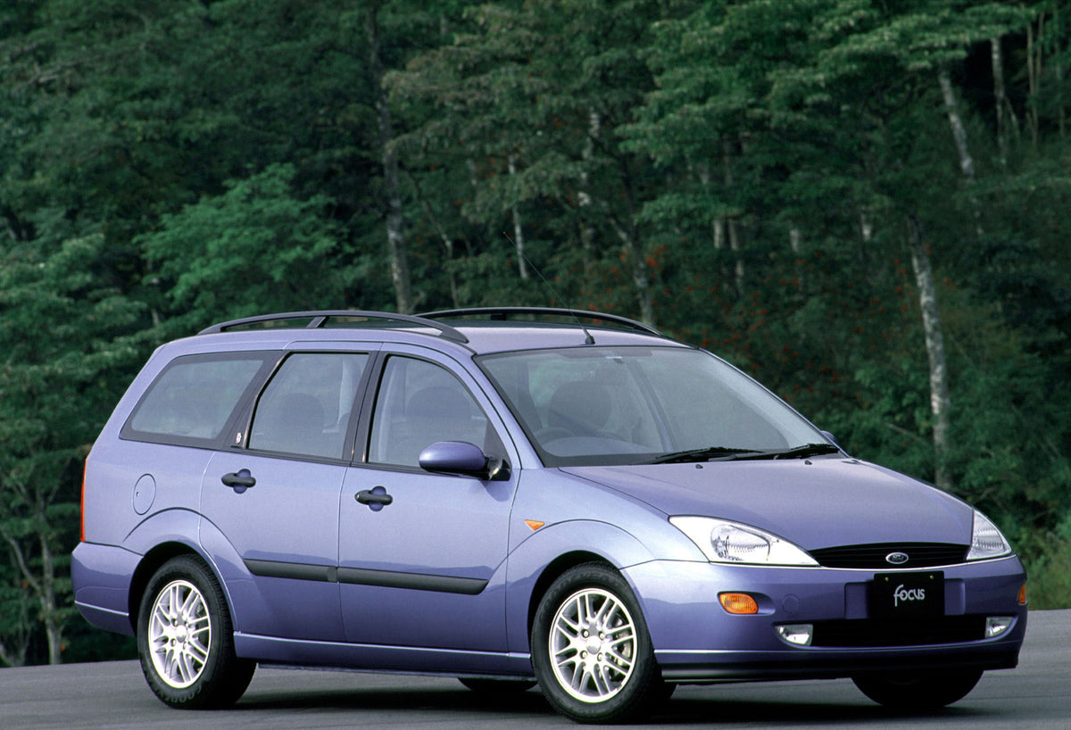 This archival image documents the 2001 Ford Focus Ghia Wagon with scenic trees MS1652 and is preserved in the Ford Heritage Vault as part of Ford Motor Company's historic photographic archive. Free for personal, non-commercial use. Ford Heritage V...