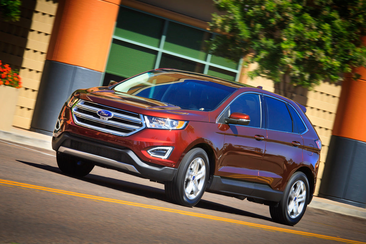 This archival image documents the 2015 Ford Edge action shot in city and is preserved in the Ford Heritage Vault as part of Ford Motor Company's historic photographic archive. Free for personal, non-commercial use. Ford Heritage Vault reference AR...
