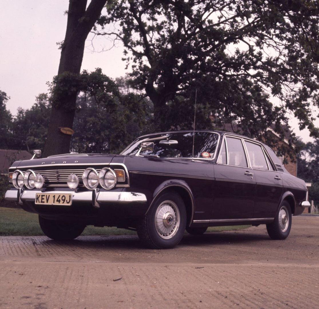 This archival image documents the 1970 Ford Zodiac Mark IV Executive on scenic street with trees and is preserved in the Ford Heritage Vault as part of Ford Motor Company's historic photographic archive. Free for personal, non-commercial use. Ford...