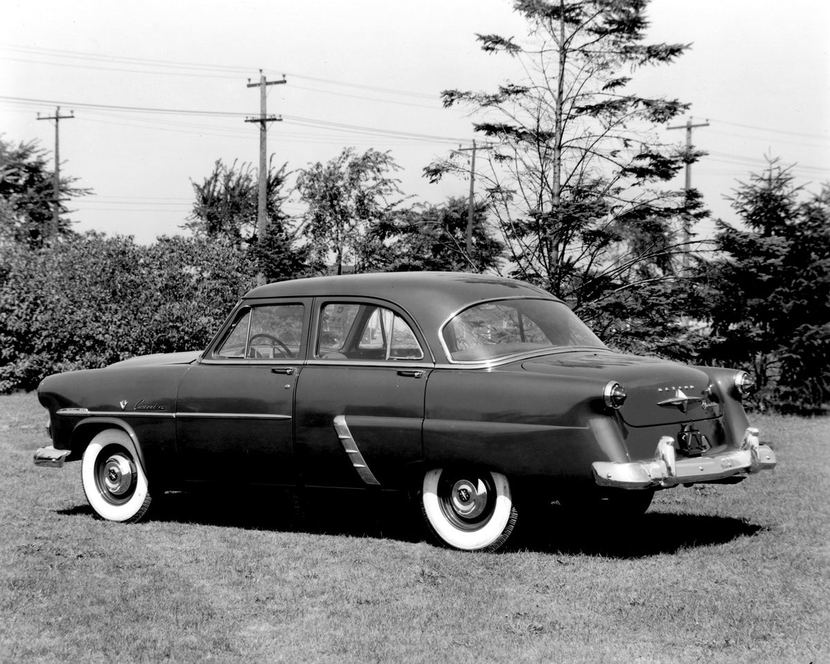 This archival image documents the 1952 Meteor Customline Sedan rear view with scenic trees AR-2007-5 and is preserved in the Ford Heritage Vault as part of Ford Motor Company's historic photographic archive. Free for personal, non-commercial use. ...