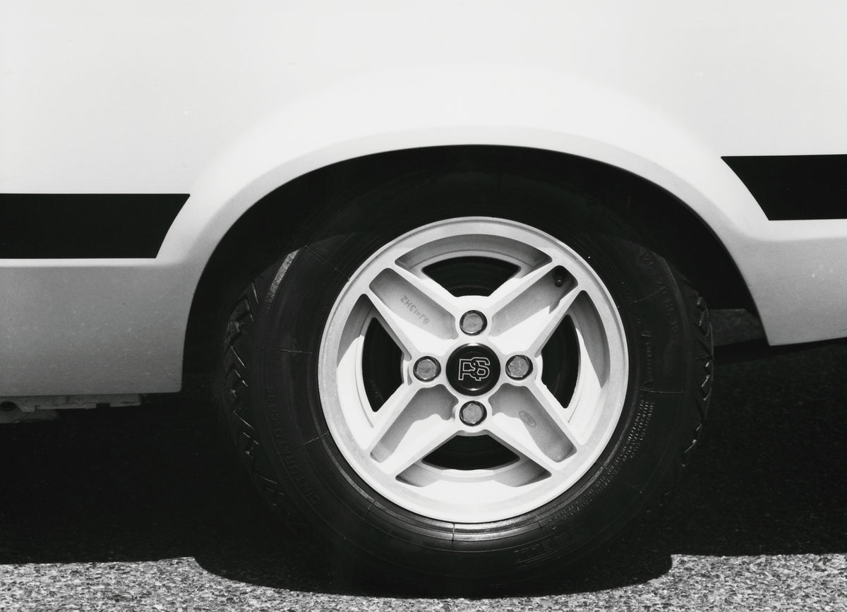 This archival image documents the 1975 Ford Escort Mark II RS2000 wheel closeup and is preserved in the Ford Heritage Vault as part of Ford Motor Company's historic photographic archive. Free for personal, non-commercial use. Ford Heritage Vault r...