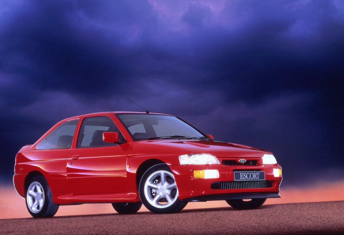 This archival image documents the 1993 Ford Escort Mark V RS Cosworth with scenic background and is preserved in the Ford Heritage Vault as part of Ford Motor Company's historic photographic archive. Free for personal, non-commercial use. Ford Her...