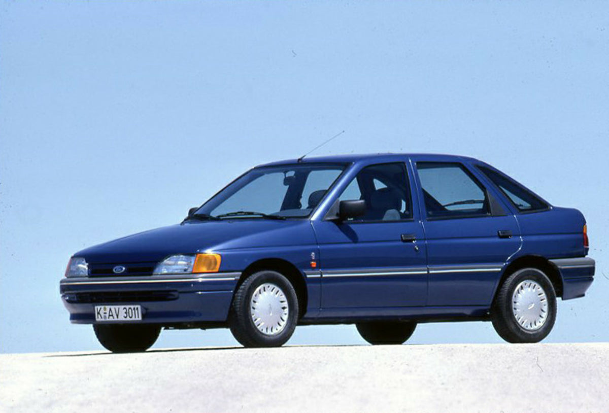 This archival image documents the 1990 Ford Escort CE-14 LHD on road in Spain and is preserved in the Ford Heritage Vault as part of Ford Motor Company's historic photographic archive. Free for personal, non-commercial use. Ford Heritage Vault ref...