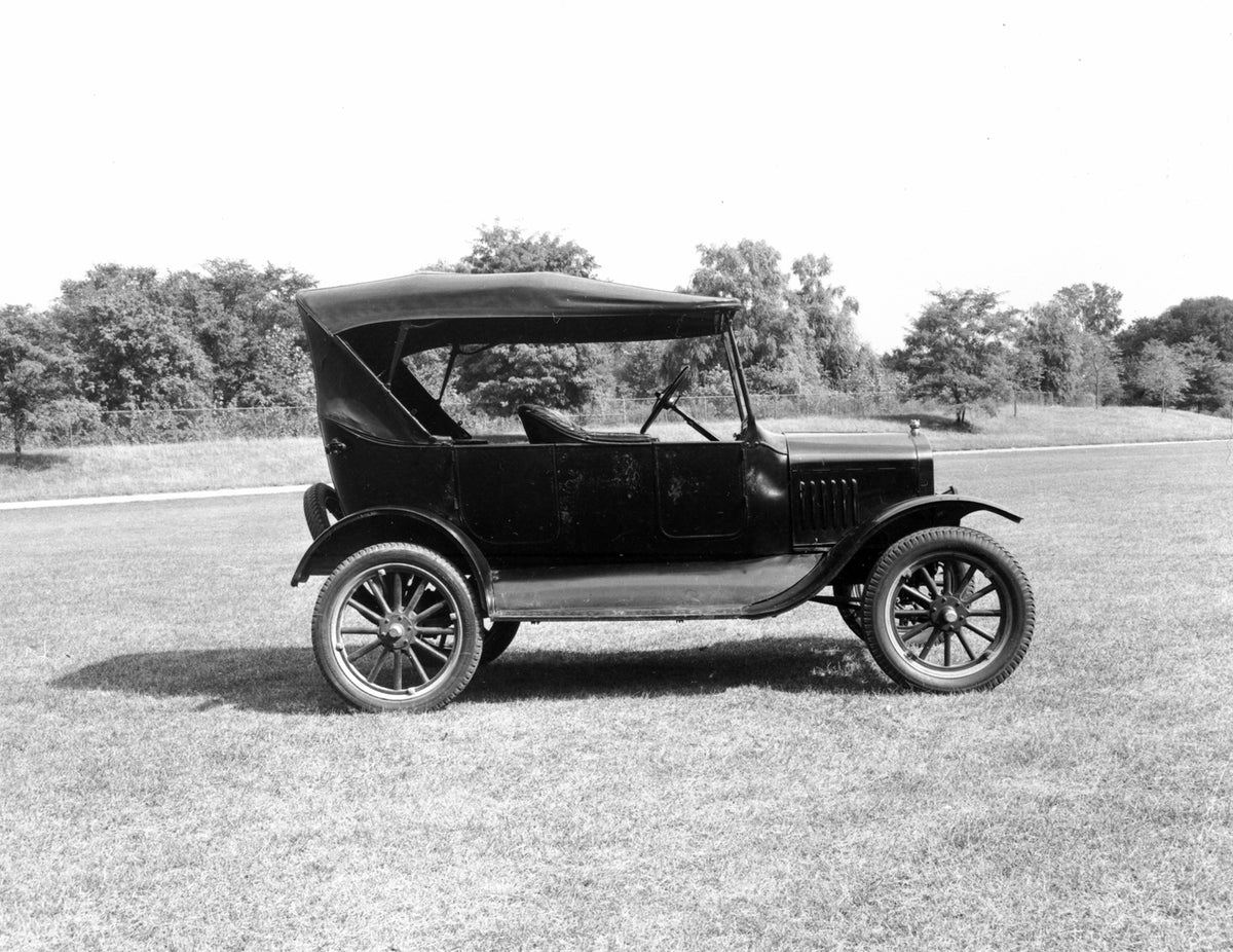 This archival image documents the 1922 Ford Model T Touring Car and is preserved in the Ford Heritage Vault as part of Ford Motor Company's historic photographic archive. Free for personal, non-commercial use. Ford Heritage Vault reference AR-2008...