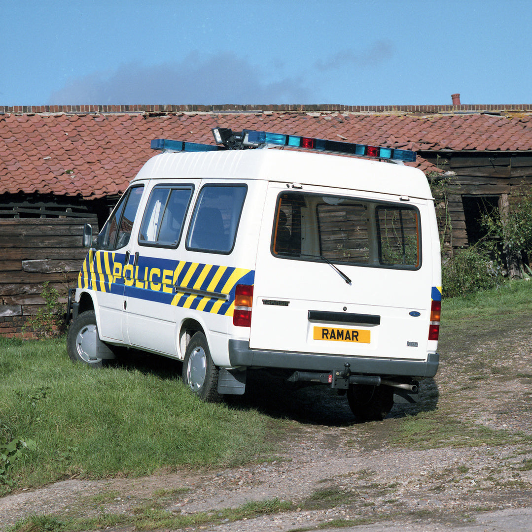 This archival image documents the 1987 Ford Transit Mark III Special Build Police Van rear view and is preserved in the Ford Heritage Vault as part of Ford Motor Company's historic photographic archive. Free for personal, non-commercial use. Ford ...