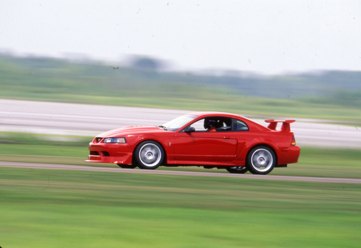This archival image documents the 2000 Ford SVT Mustang Cobra and is preserved in the Ford Heritage Vault as part of Ford Motor Company's historic photographic archive. Free for personal, non-commercial use. Ford Heritage Vault reference AR-2008-8...