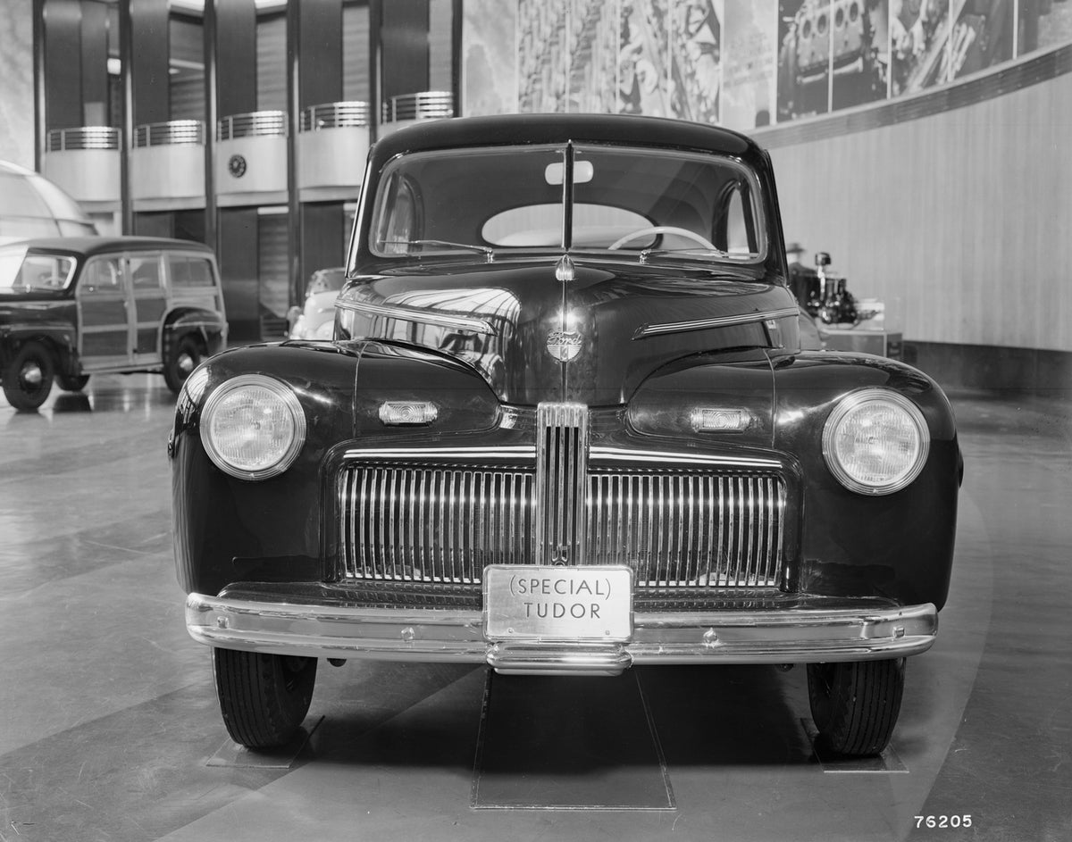This archival image documents the 1942 Ford Deluxe (Special) tudor sedan and is preserved in the Ford Heritage Vault as part of Ford Motor Company's historic photographic archive. Free for personal, non-commercial use. Ford Heritage Vault referenc...