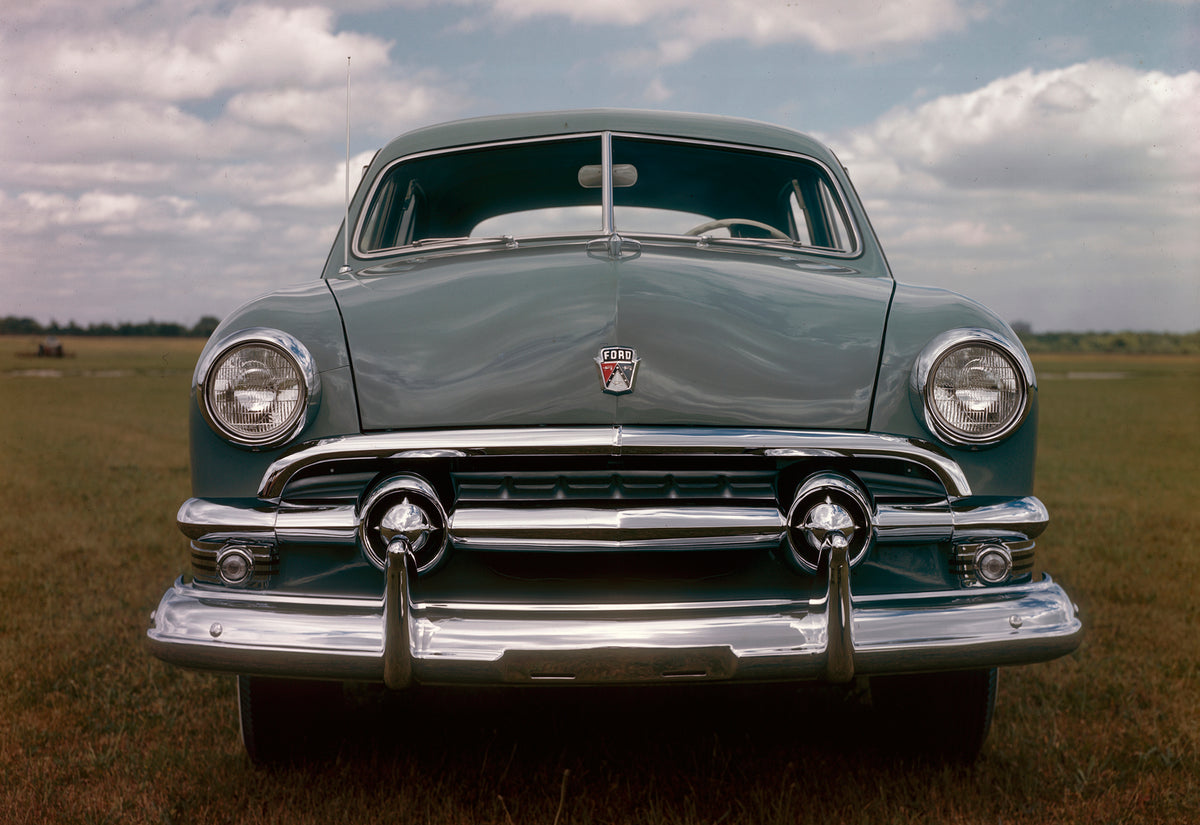 This archival image documents the 1951 Ford Custom four-door sedan and is preserved in the Ford Heritage Vault as part of Ford Motor Company's historic photographic archive. Free for personal, non-commercial use. Ford Heritage Vault reference AR-2...