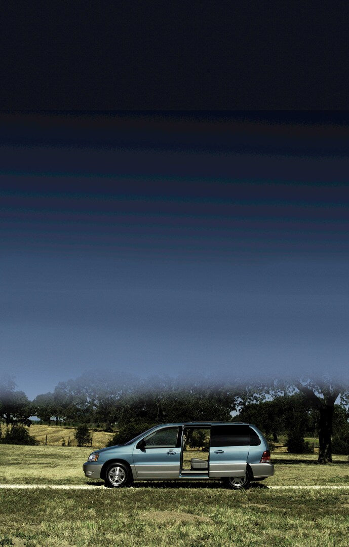 This archival image documents the 2004 Ford Freestar scenic with doors open and is preserved in the Ford Heritage Vault as part of Ford Motor Company's historic photographic archive. Free for personal, non-commercial use. Ford Heritage Vault refer...