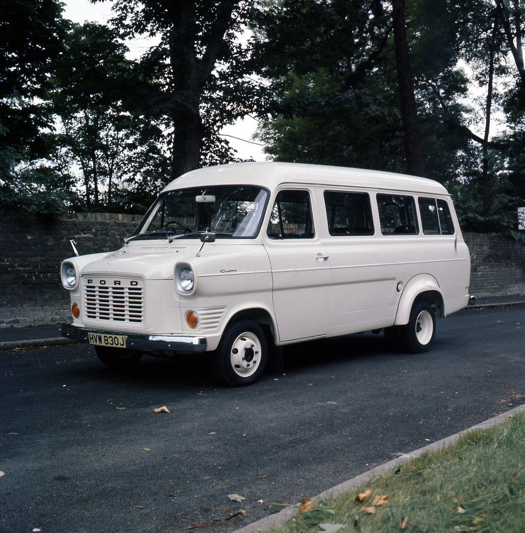 This archival image documents the 1970 Ford Transit Mark I Bus on scenic road and is preserved in the Ford Heritage Vault as part of Ford Motor Company's historic photographic archive. Free for personal, non-commercial use. Ford Heritage Vault ref...