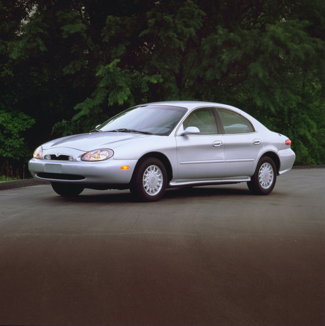 This archival image documents the 1996 Mercury Sable front angle with trees in background AR-2002-213709-150 and is preserved in the Ford Heritage Vault as part of Ford Motor Company's historic photographic archive. Free for personal, non-commerci...