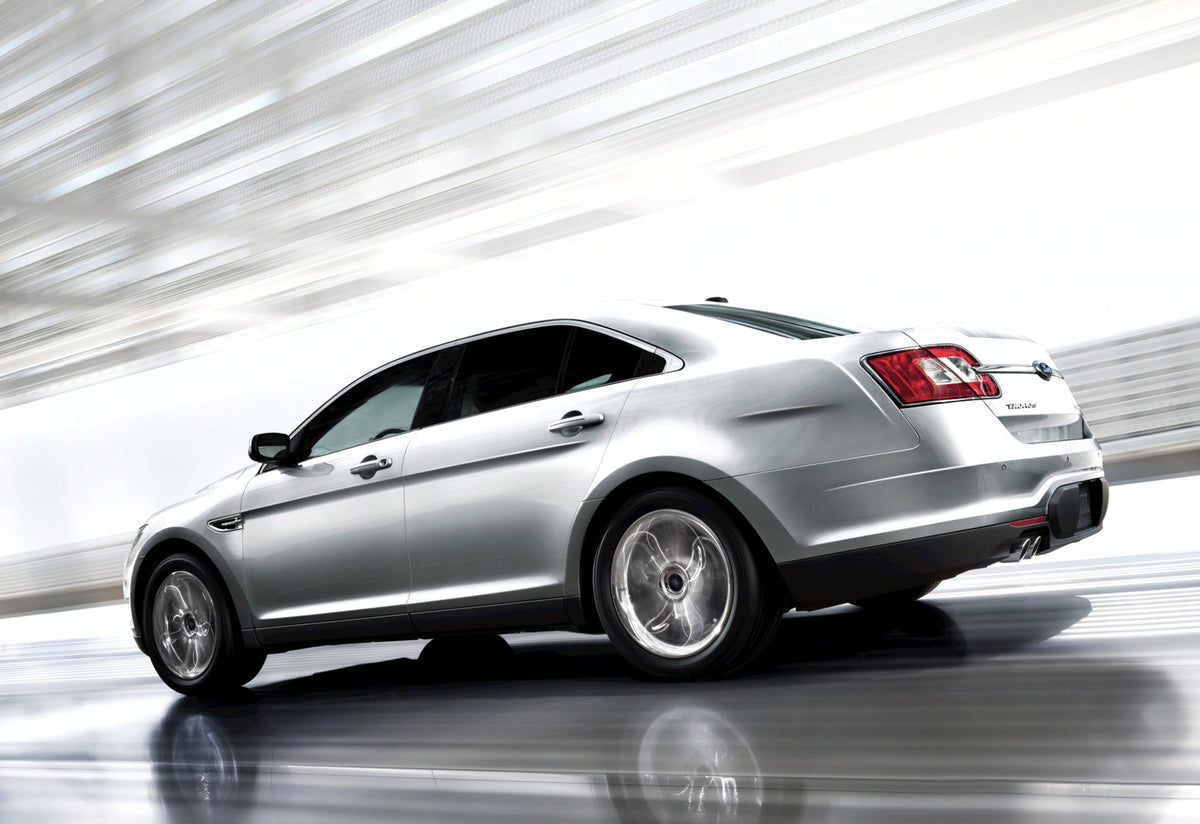 This archival image documents the 2011 Ford Taurus action shot on road MS02108 and is preserved in the Ford Heritage Vault as part of Ford Motor Company's historic photographic archive. Free for personal, non-commercial use. Ford Heritage Vault re...