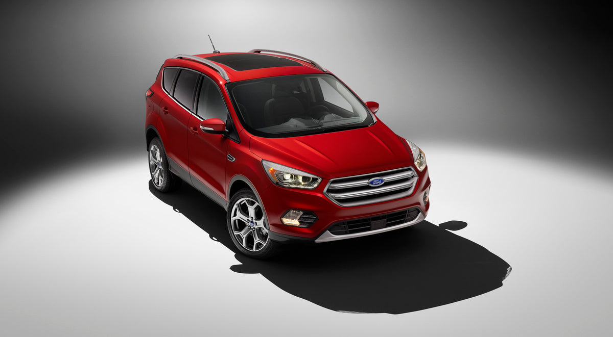 This archival image documents the 2017 Ford Escape Titanium studio shot and is preserved in the Ford Heritage Vault as part of Ford Motor Company's historic photographic archive. Free for personal, non-commercial use. Ford Heritage Vault reference...