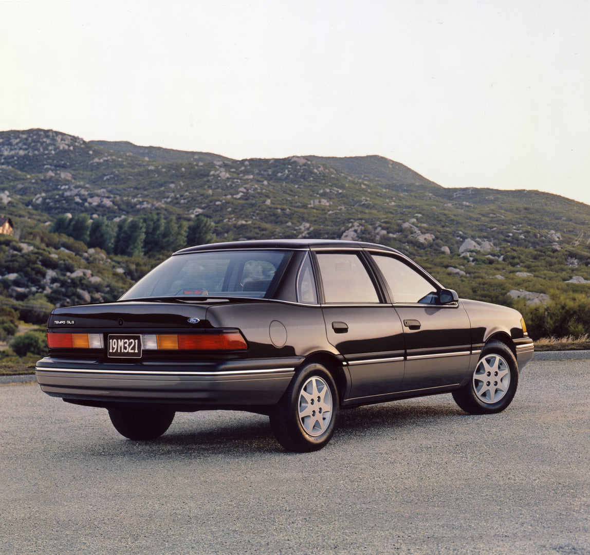 This archival image documents the 1988 Ford Tempo GLS four-door and is preserved in the Ford Heritage Vault as part of Ford Motor Company's historic photographic archive. Free for personal, non-commercial use. Ford Heritage Vault reference AR-2008...