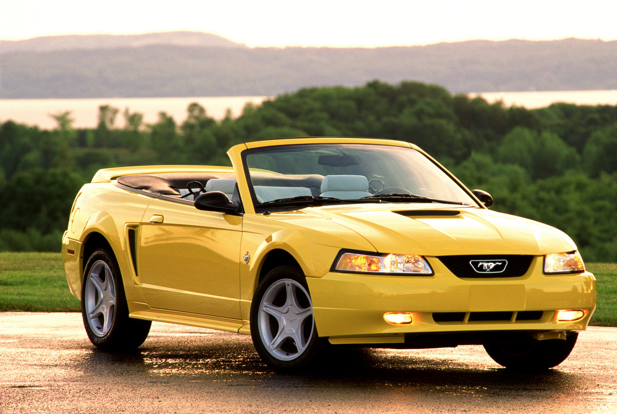This archival image documents the 1999 Ford Mustang GT convertible and is preserved in the Ford Heritage Vault as part of Ford Motor Company's historic photographic archive. Free for personal, non-commercial use. Ford Heritage Vault reference AR-2...