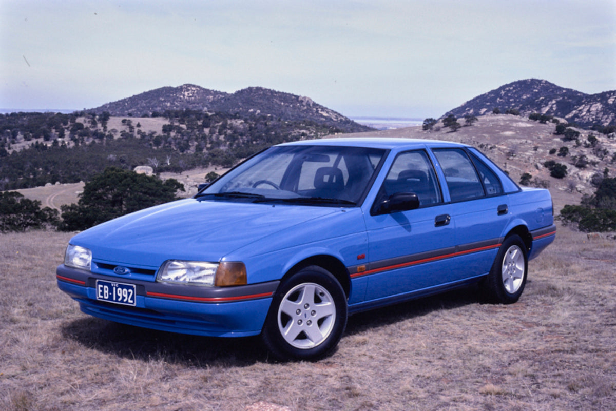 This archival image documents the 1992 Ford EB Falcon S Sedan Passenger Side Front End View on Mountainous Terrain FAP-2011-3 and is preserved in the Ford Heritage Vault as part of Ford Motor Company's historic photographic archive. Free for perso...
