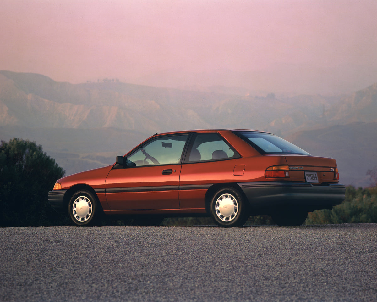 This archival image documents the 1991 Ford Escort LX and is preserved in the Ford Heritage Vault as part of Ford Motor Company's historic photographic archive. Free for personal, non-commercial use. Ford Heritage Vault reference AR-2008-8.1.2.7052.
