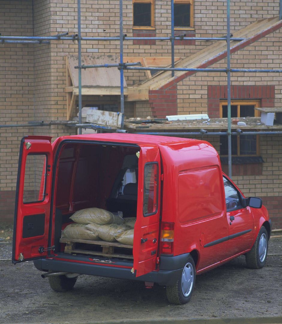 This archival image documents the 1996 Ford Fiesta Mark IV Courier 50 Van rear view with open doors on construction site AR-2002-213709 and is preserved in the Ford Heritage Vault as part of Ford Motor Company's historic photographic archive. Free...