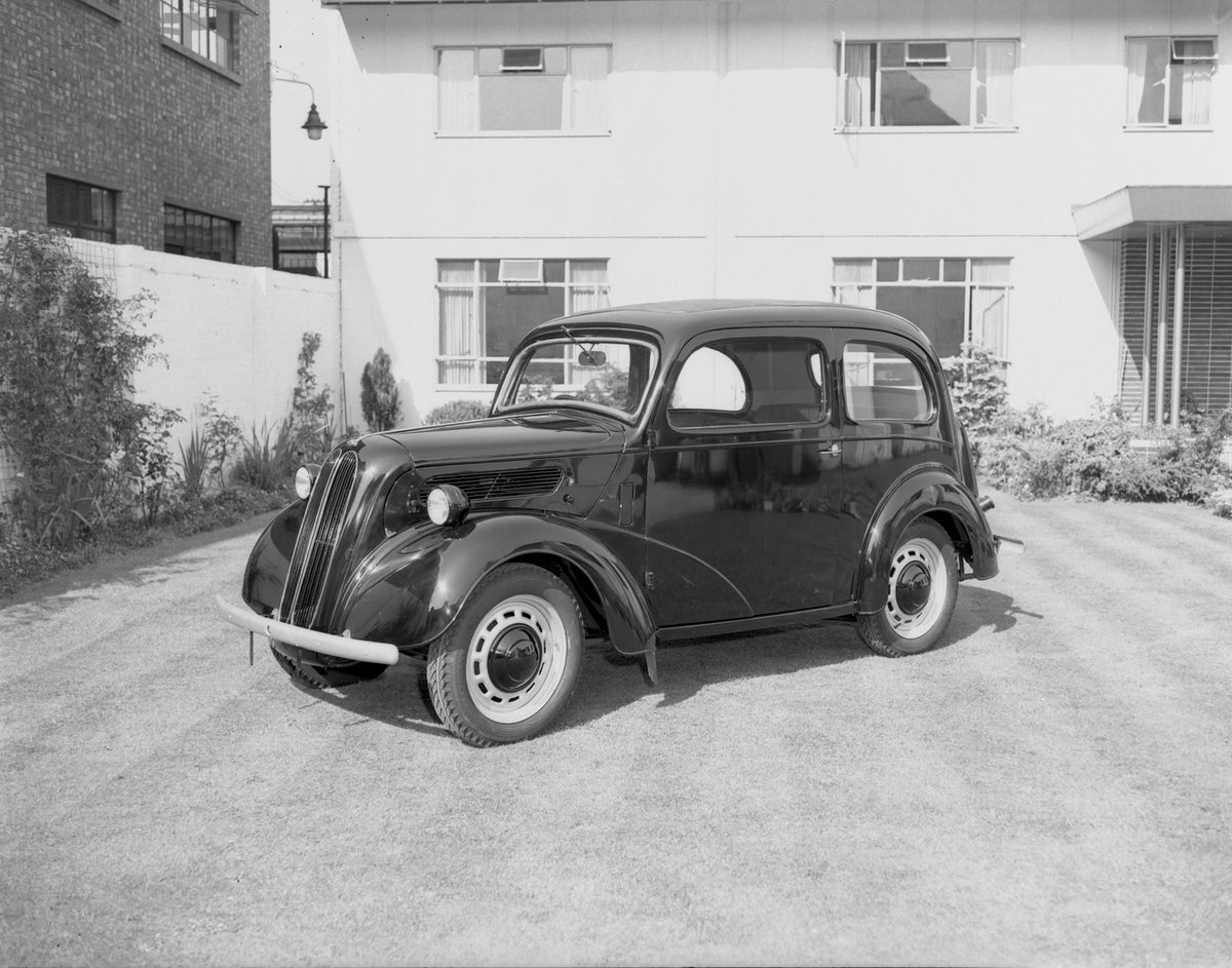 This archival image documents the 1953 Ford Popular at Briggs and is preserved in the Ford Heritage Vault as part of Ford Motor Company's historic photographic archive. Free for personal, non-commercial use. Ford Heritage Vault reference AR-2000-2...