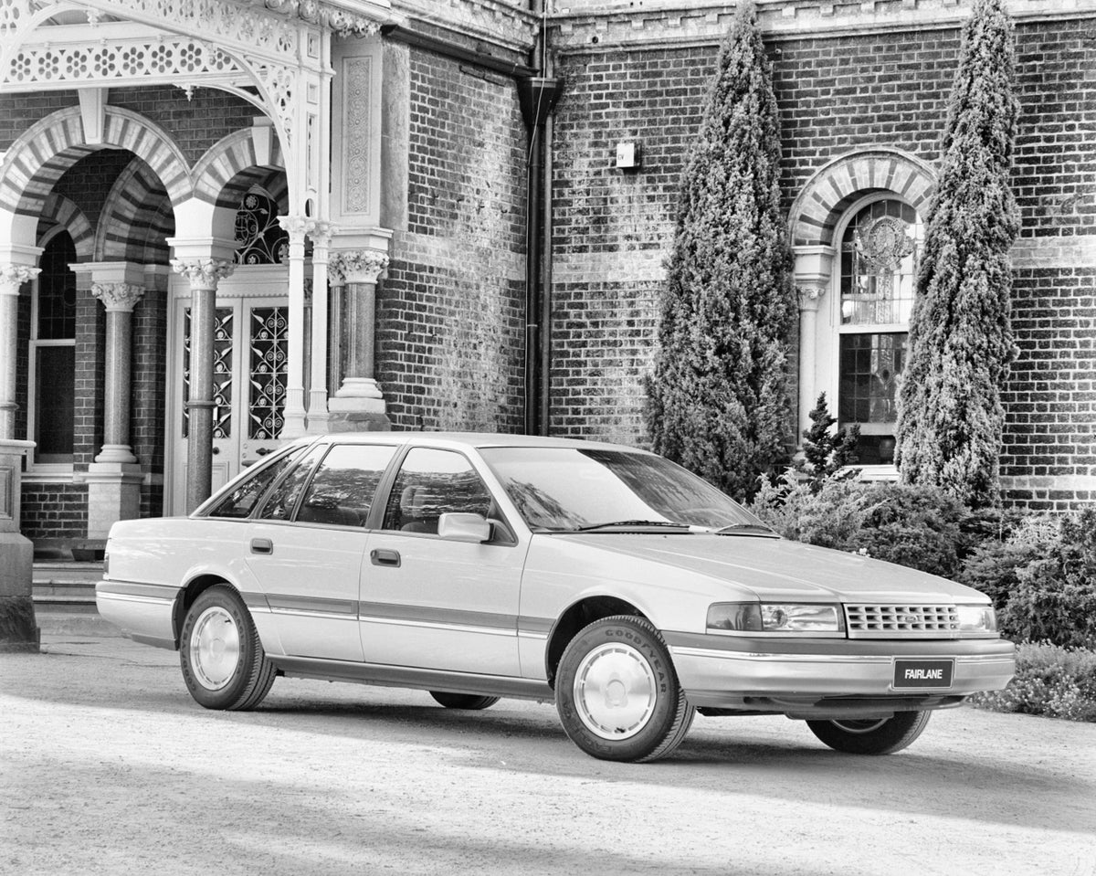 This archival image documents the 1988 Ford NA Fairlane Sedan Driver Side Front End View in Driveway FAP-2011-3 and is preserved in the Ford Heritage Vault as part of Ford Motor Company's historic photographic archive. Free for personal, non-comme...