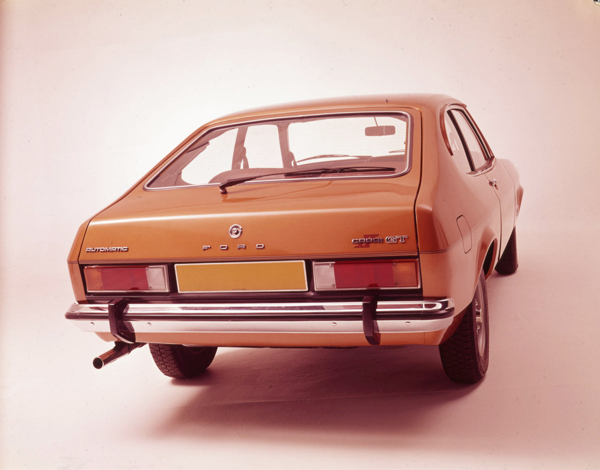 This archival image documents the 1974 Ford Capri II GT Automatic rear view in studio and is preserved in the Ford Heritage Vault as part of Ford Motor Company's historic photographic archive. Free for personal, non-commercial use. Ford Heritage V...