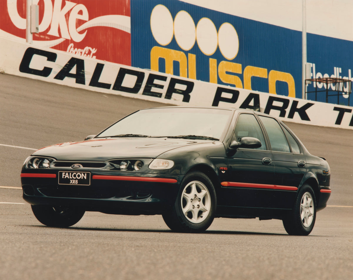 This archival image documents the 1996 Ford EL Falcon XR6 Sedan Passenger Side Front End View on Race Track FAP-2011-3 and is preserved in the Ford Heritage Vault as part of Ford Motor Company's historic photographic archive. Free for personal, no...