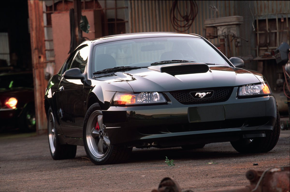 This archival image documents the 2001 Ford Mustang Bullitt GT coupe and is preserved in the Ford Heritage Vault as part of Ford Motor Company's historic photographic archive. Free for personal, non-commercial use. Ford Heritage Vault reference AR...