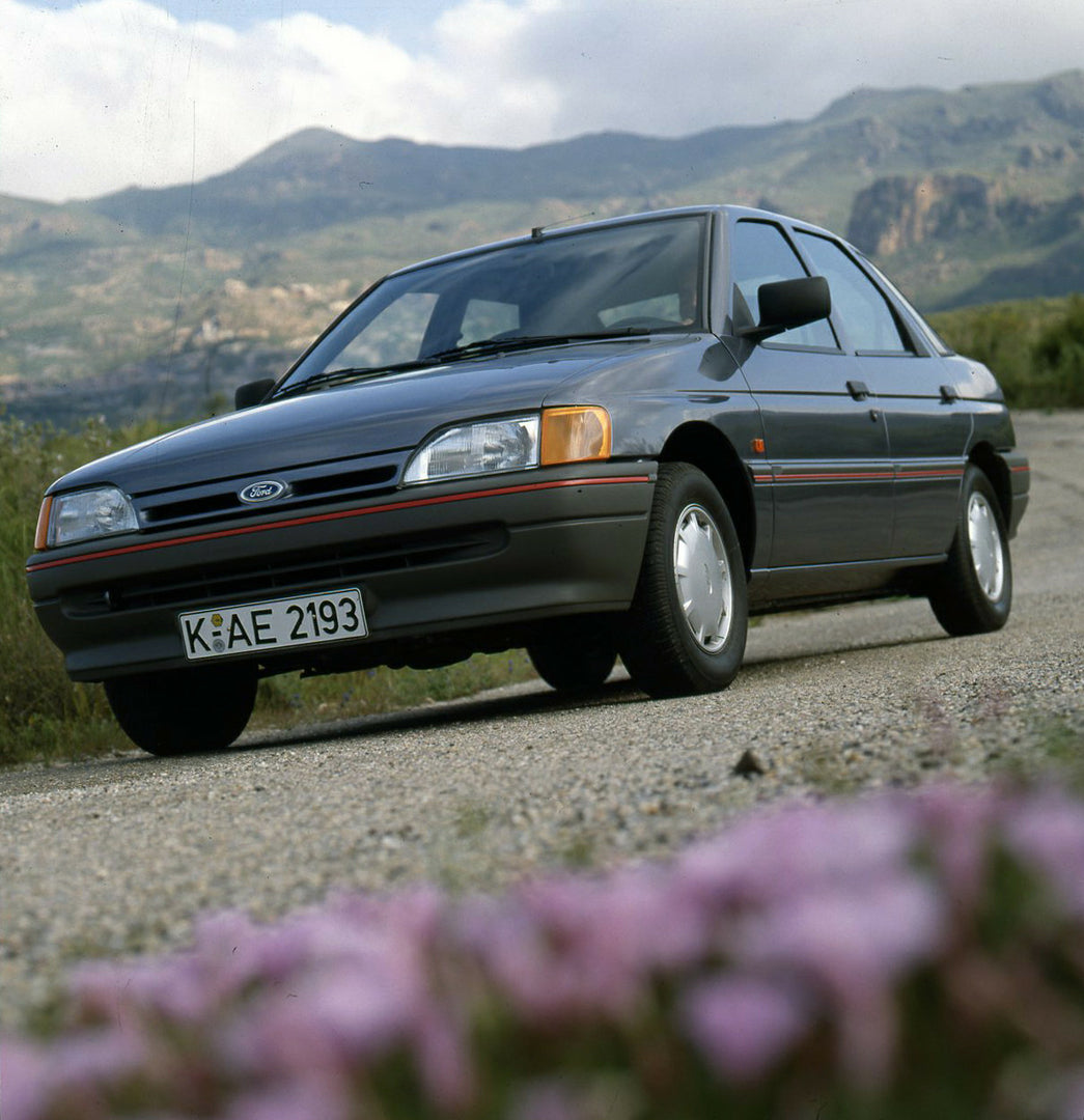 This archival image documents the 1990 Ford Escort CE-14 LHD on road in Spain and is preserved in the Ford Heritage Vault as part of Ford Motor Company's historic photographic archive. Free for personal, non-commercial use. Ford Heritage Vault ref...