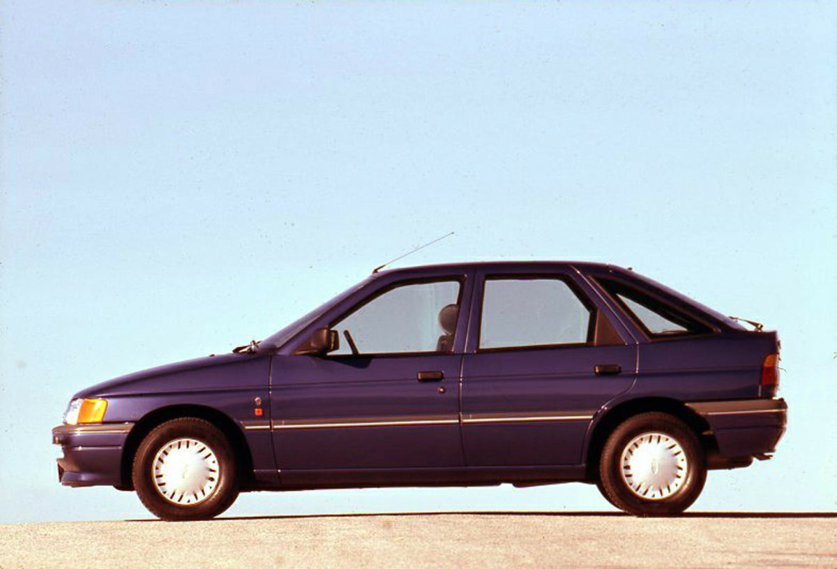 This archival image documents the 1990 Ford Escort CE-14 LHD on road in Spain and is preserved in the Ford Heritage Vault as part of Ford Motor Company's historic photographic archive. Free for personal, non-commercial use. Ford Heritage Vault ref...