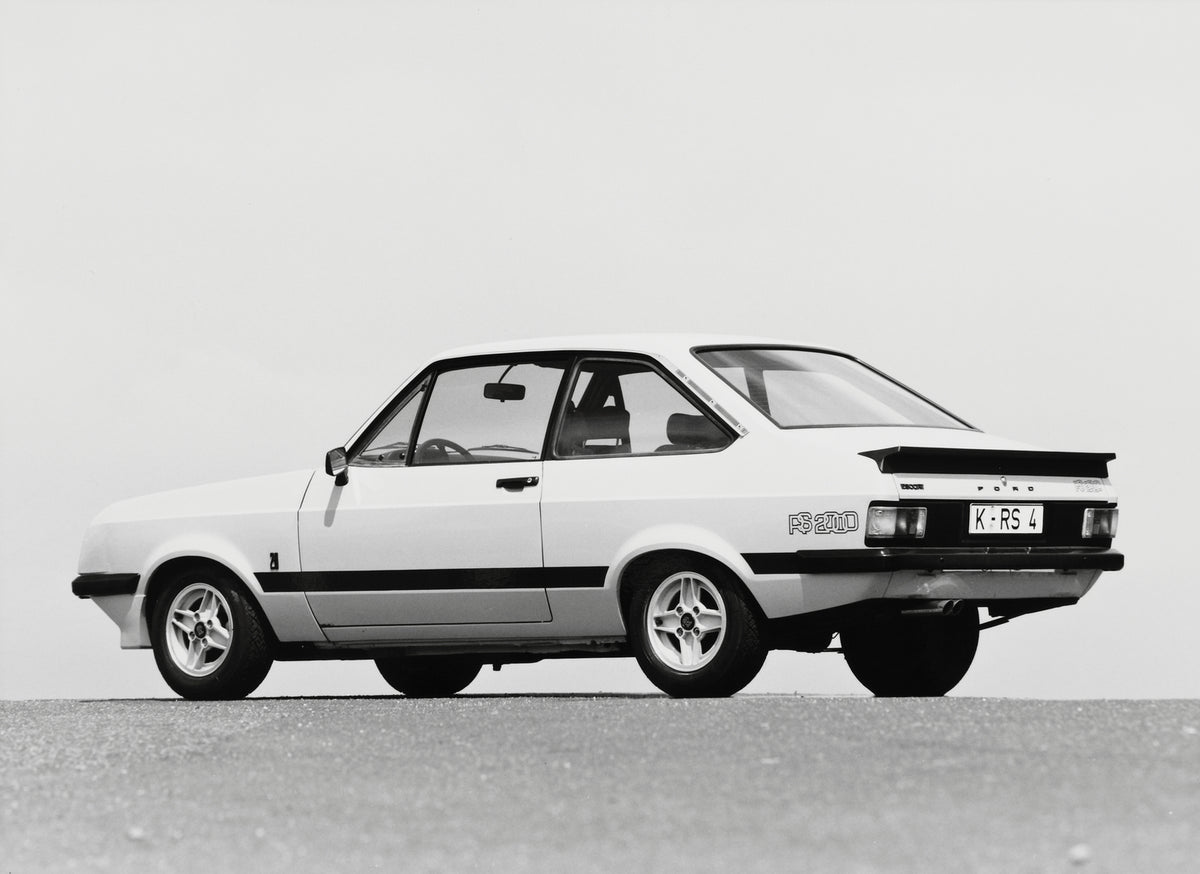 This archival image documents the 1975 Ford Escort Mark II RS2000 rear view on pavement and is preserved in the Ford Heritage Vault as part of Ford Motor Company's historic photographic archive. Free for personal, non-commercial use. Ford Heritage...